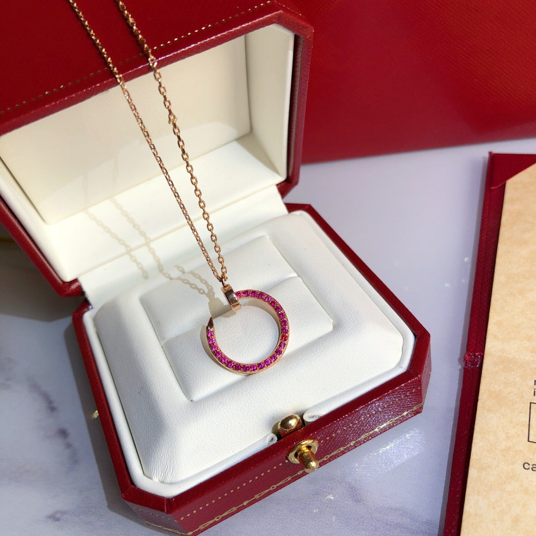 CARTIER JUSTE NECKLACE GOLD RED DIAMONDS